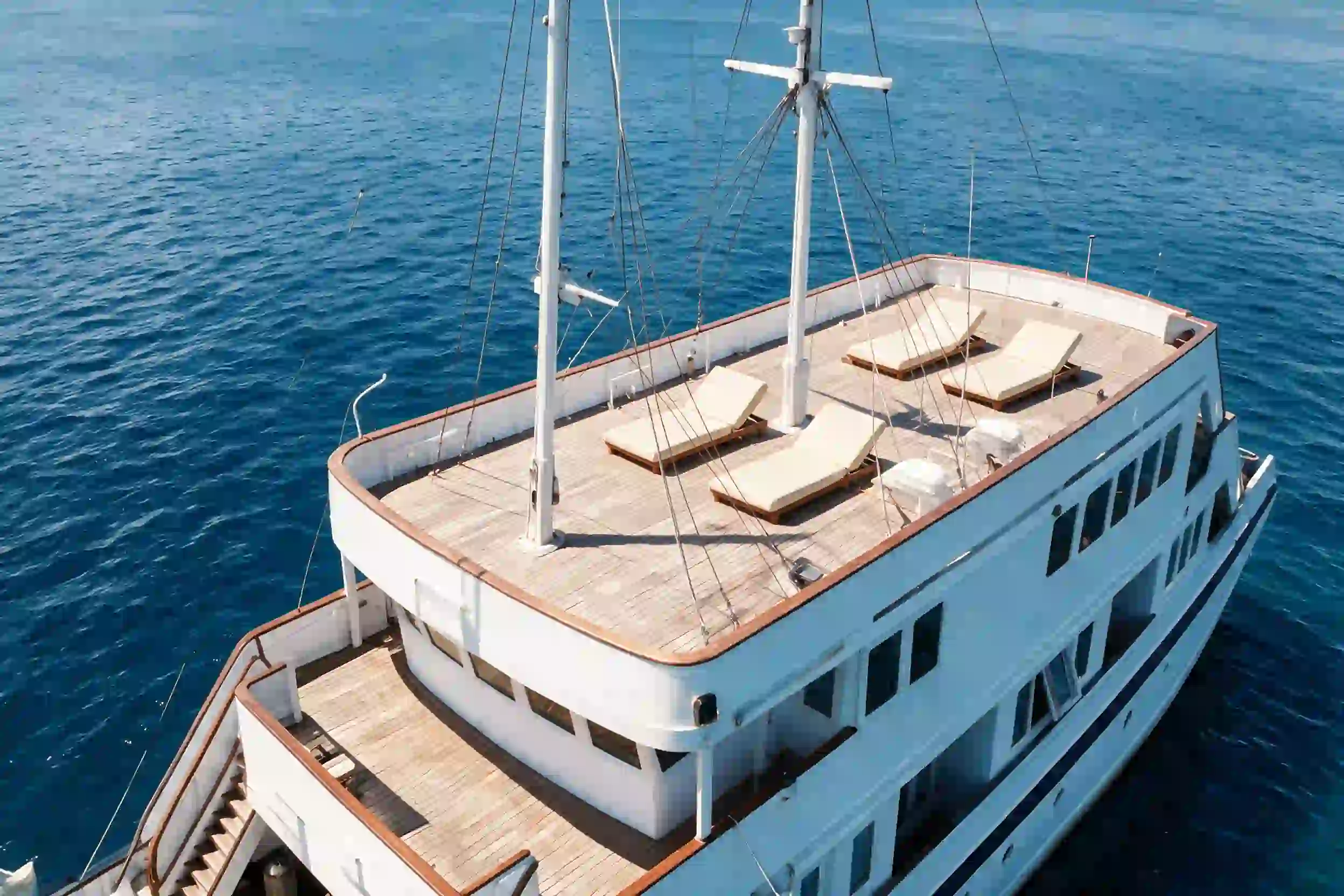 Lasha sun deck loungers and twin masts