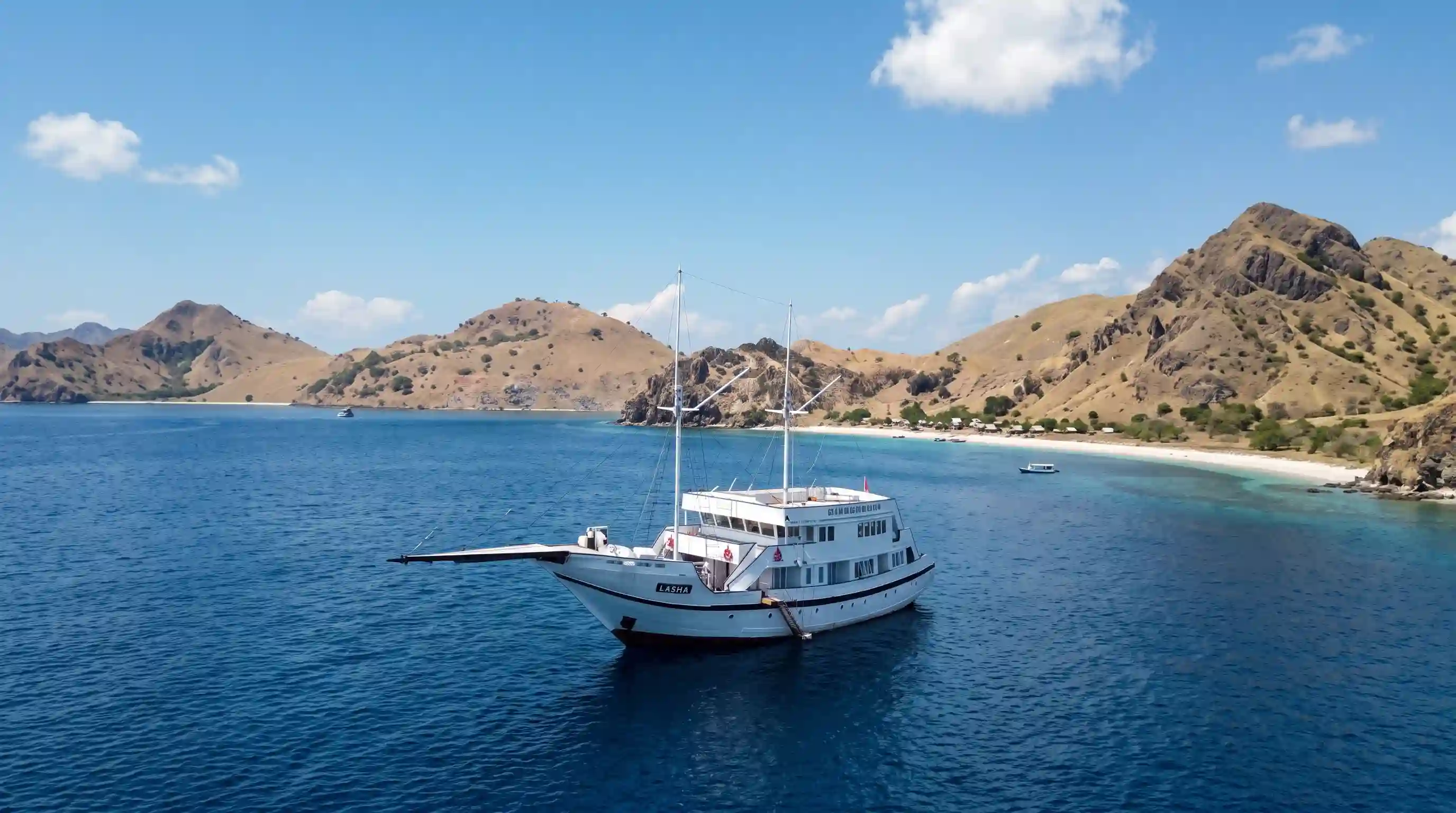 Lasha at anchor off a Komodo beach