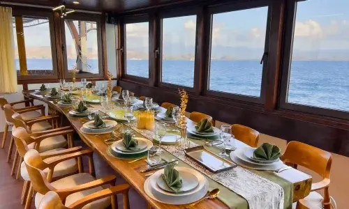 Open Trip Indoor Dining Area — Komodo National Park, by our operator Komodo Luxury