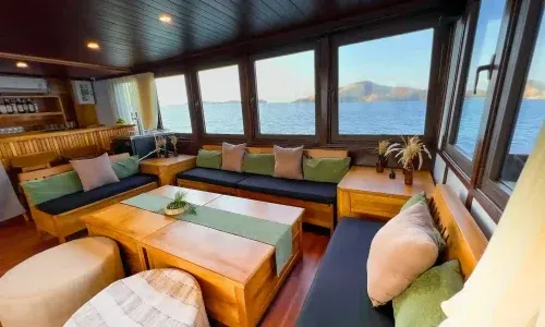 Open Trip Indoor Lounge — Komodo National Park, by our operator Komodo Luxury