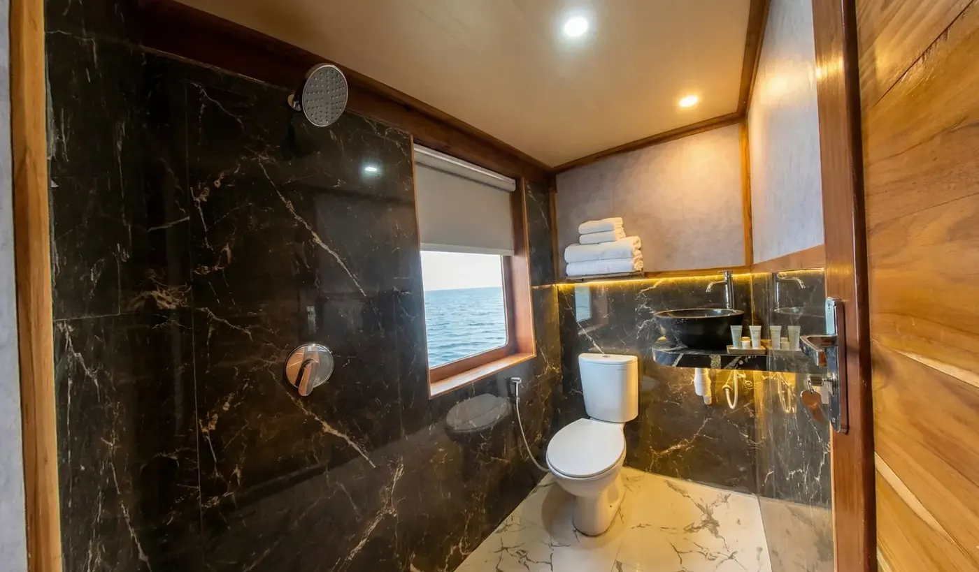 Suite Cabin Naturalia Cruise Bathroom — Komodo National Park, by our operator Komodo Luxury